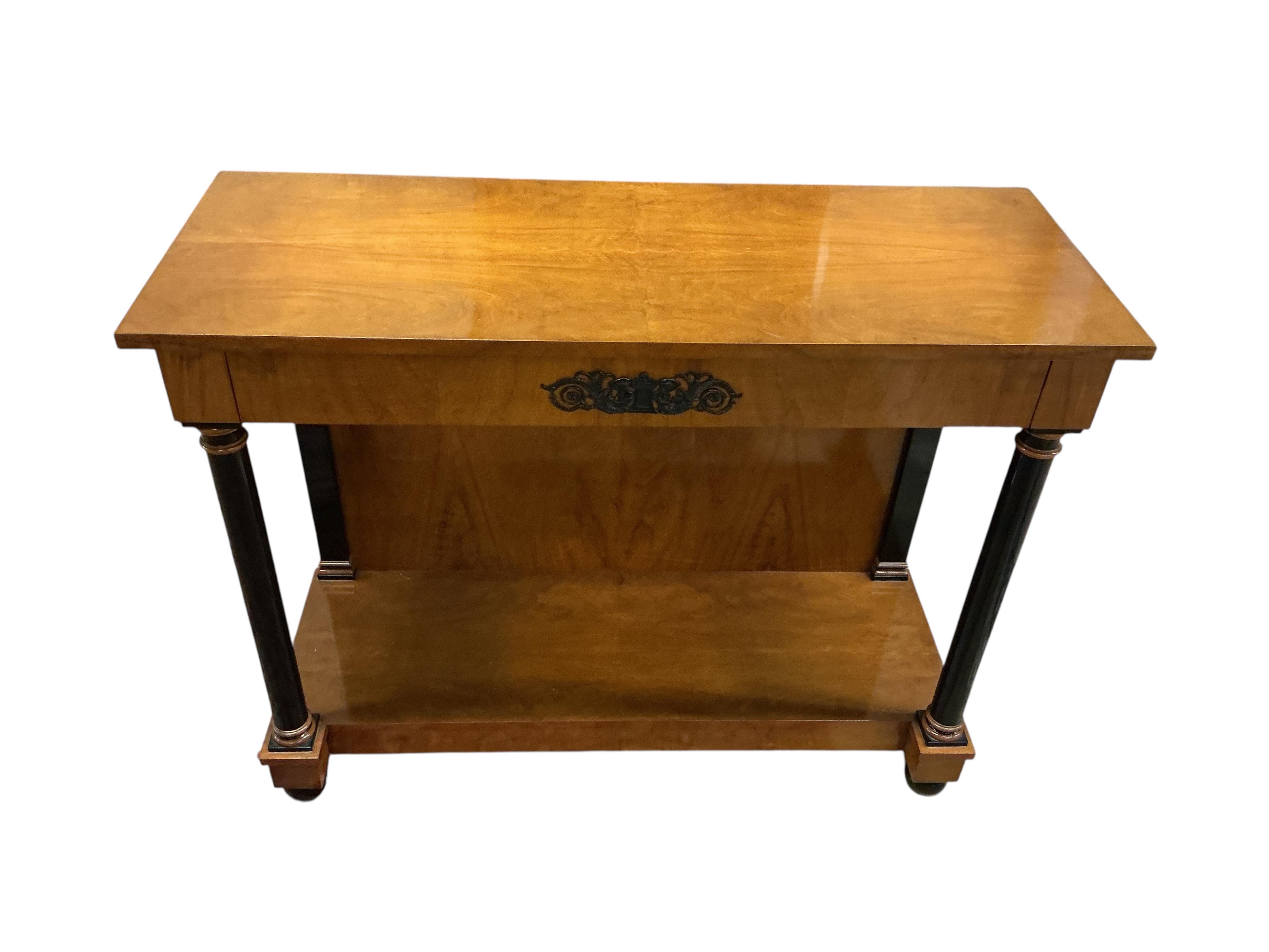 A pair of Biedermeier style cherry two tier console tables, with frieze drawers, width 110cm, depth 42cm, height 86cm